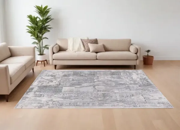 6.5' x 9.3' Abstract Power Loom Area Rug - Blue