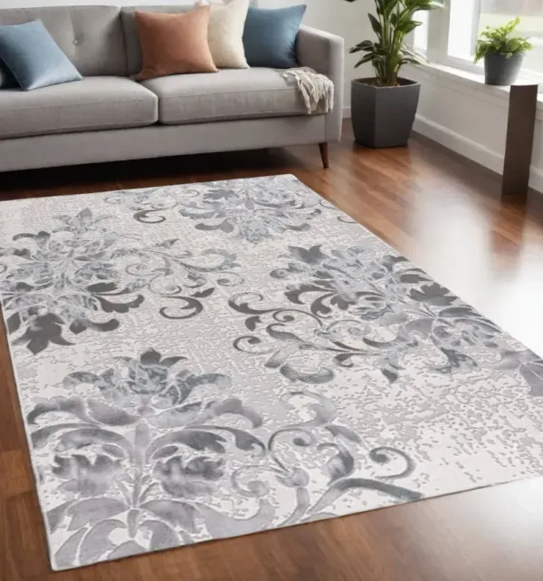 5.3' x 7.5' Damask Power Loom Area Rug - Blue