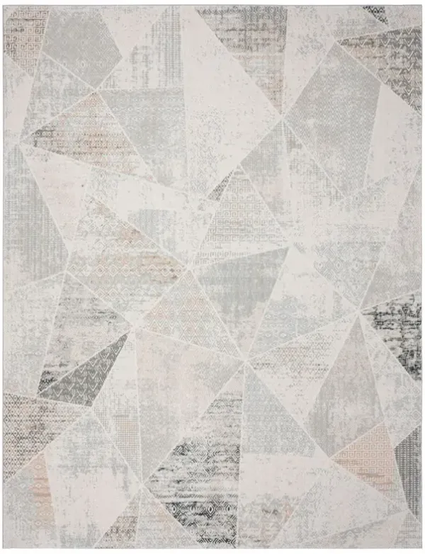 9' x 12' Geometric Distressed Stain Resistant Area Rug - Gray Blue Taupe And Cream