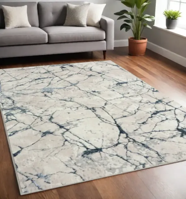 5' x 7' Abstract Stain Resistant Area Rug - Gray And Blue