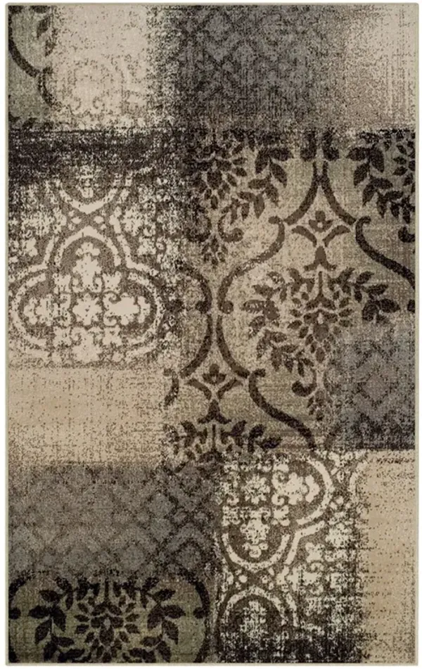 4' x 6' Damask Distressed Stain Resistant Area Rug - Tan And Brown