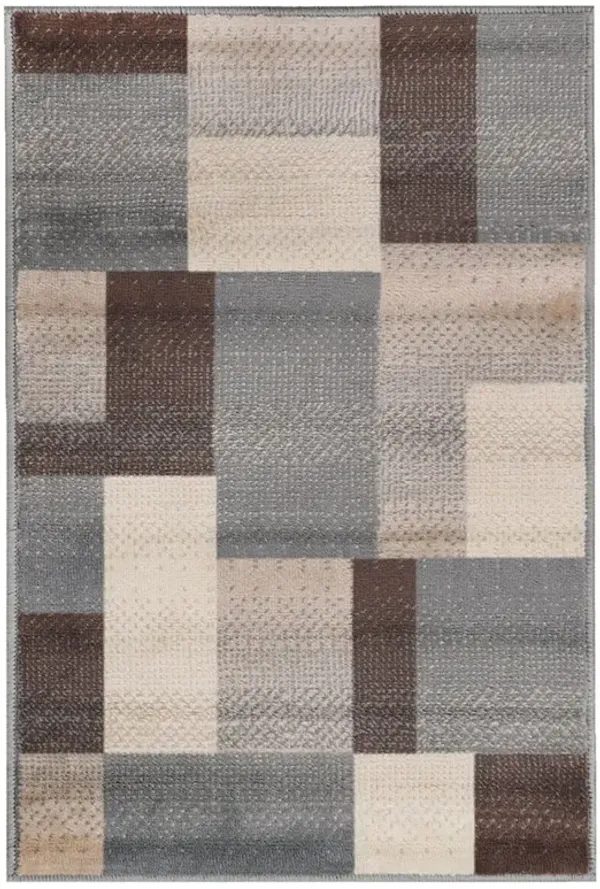 7' x 9' Patchwork Power Loom Stain Resistant Area Rug - Gray