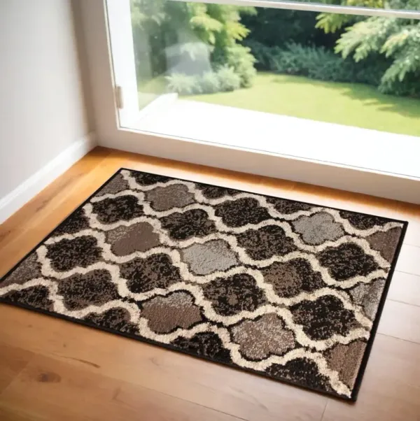 3' x 5' Quatrefoil Power Loom Distressed Stain Resistant Area Rug - Chocolate