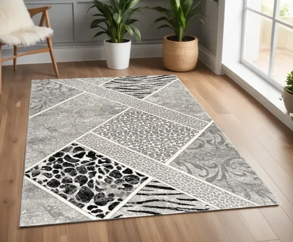 3.8' x 5.8' Geometric Power Loom Stain Resistant Area Rug - Grey