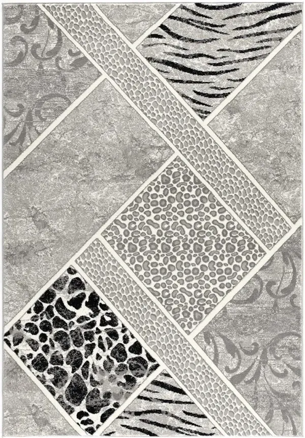 5' x 8' Geometric Power Loom Stain Resistant 100% Olefin Heatset Area Rug - Gray