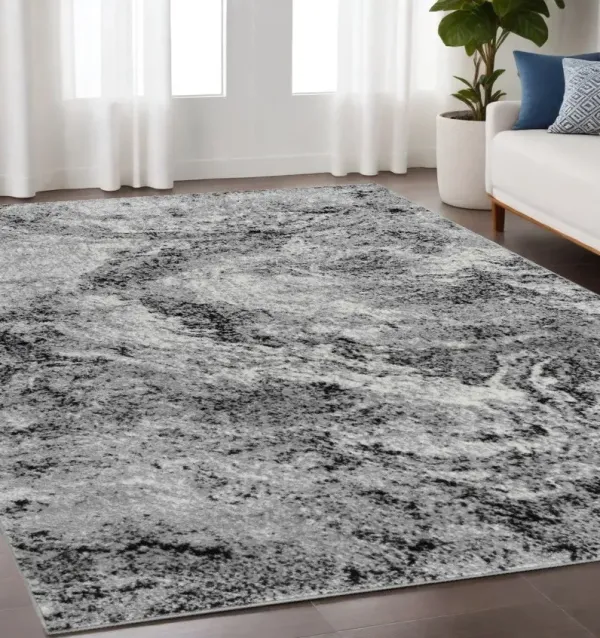 5.3' x 7.6' Abstract Polypropylene Area Rug - Grey