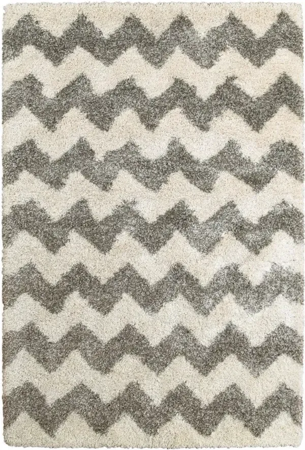 6.6' x 9.5' Geometric Shag Power Loom Stain Resistant Area Rug - Grey And Ivory