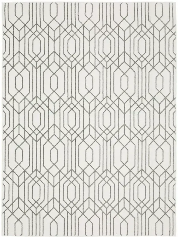 5.3' x 7.7' Geometric Power Loom Stain Resistant Area Rug - White And Grey