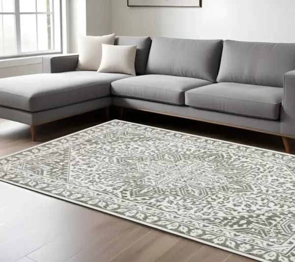 6.6' x 9.7' Oriental Power Loom Area Rug - Gray And White