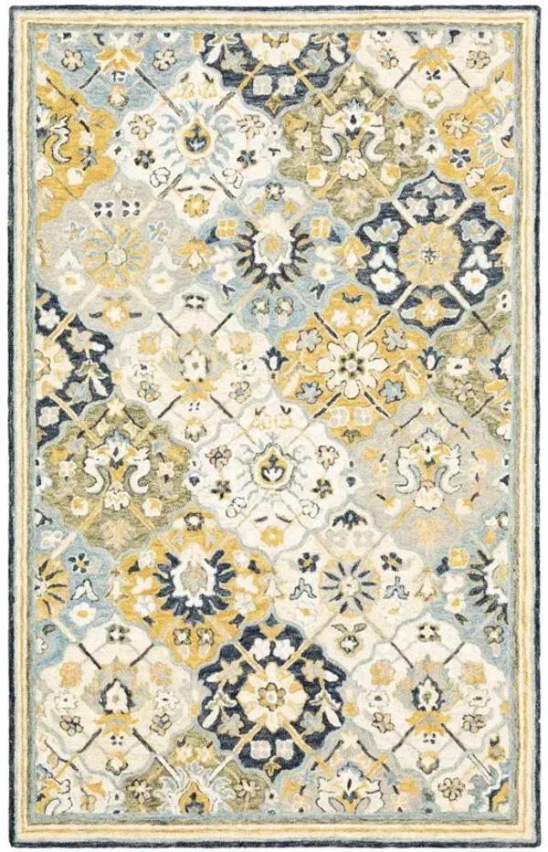 5' x 8' Geometric Tufted Handmade Stain Resistant Area Rug - Blue Green Gold Navy And Ivory