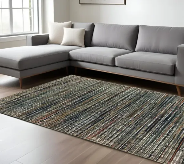 6' x 9' Abstract Power Loom Stain Resistant Area Rug - Black Navy Gold Ivory And Blush