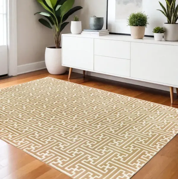3.8' x 5.4' Geometric Power Loom Stain Resistant Area Rug - Gold And Ivory