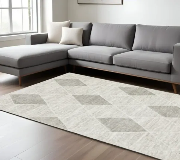 7.9' x 10.8' Geometric Power Loom Stain Resistant Area Rug - Grey And Ivory