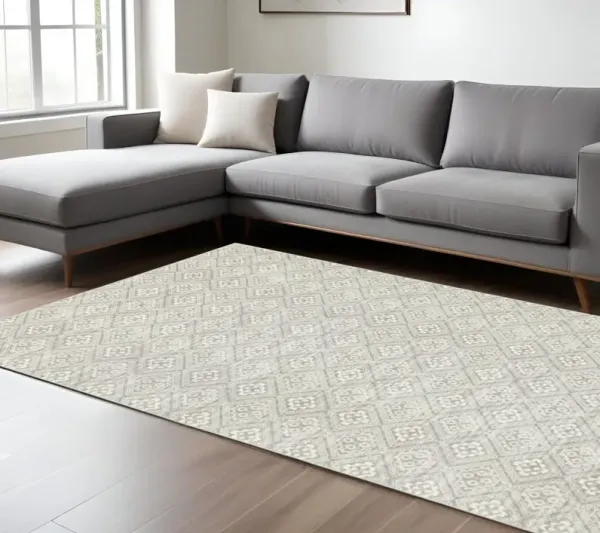 6' x 9' Geometric Power Loom Stain Resistant Area Rug - Gray