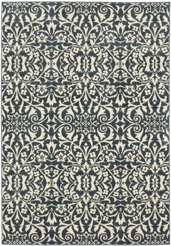 5.3' x 7.2' Floral Power Loom Stain Resistant Area Rug - Blue And Ivory