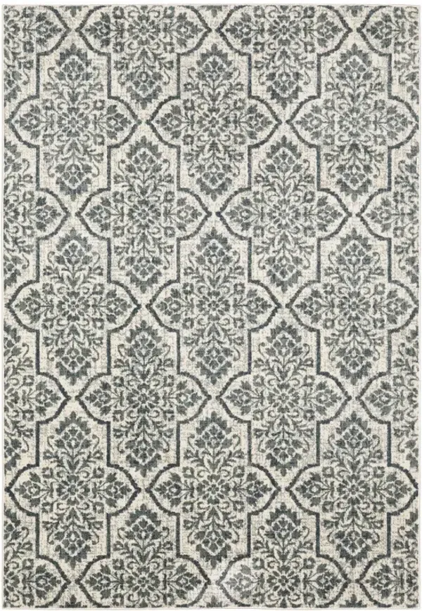 10' x 13' Floral Power Loom Stain Resistant Area Rug - Ivory Blue And Sage
