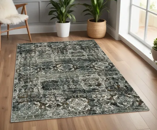 3.8' x 5.4' Oriental Power Loom Stain Resistant Area Rug - Ivory Charcoal Grey Blue Rust Gold And Brown