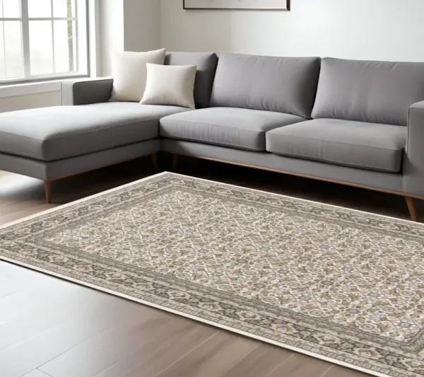 6' x 9' Oriental Power Loom Stain Resistant Area Rug With Fringe - Ivory And Gray