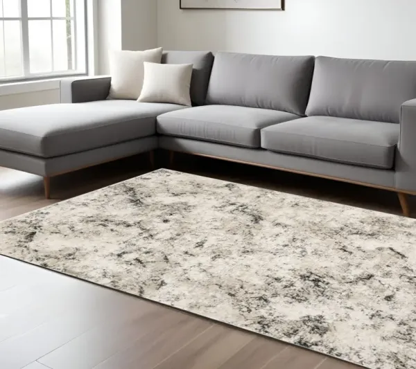 6' x 9' Abstract Power Loom Stain Resistant Area Rug - Ivory Gray Black Beige And Tan