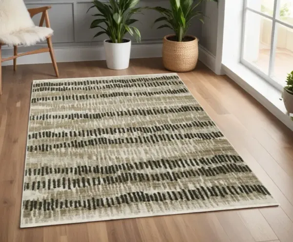 4' x 6' Abstract Power Loom Stain Resistant Area Rug With Fringe - Beige Ivory Charcoal Brown Tan And Gray
