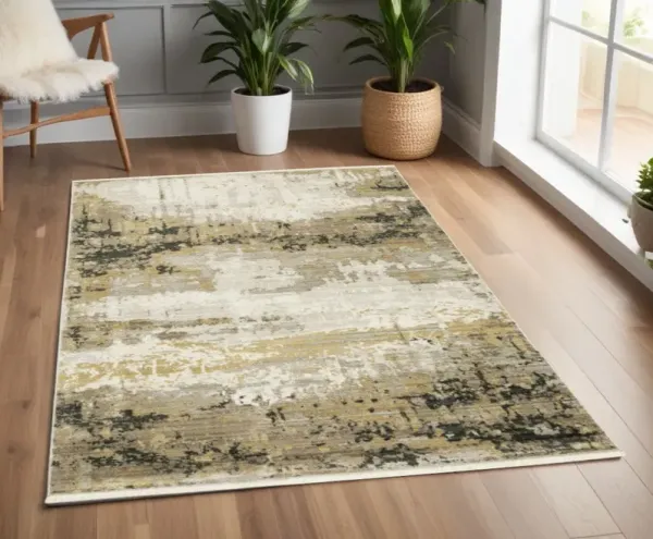 4' x 6' Abstract Power Loom Stain Resistant Area Rug With Fringe - Gray Gold Black Charcoal And Beige