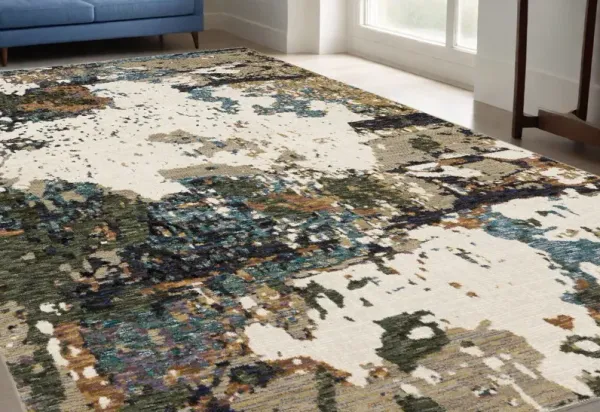 5.3' x 7.6' Abstract Power Loom Area Rug - Blue And Ivory