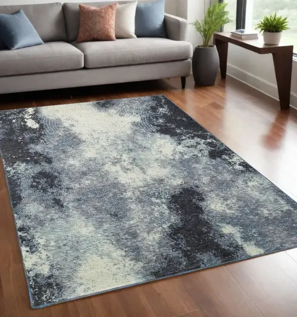 5' x 7' Abstract Power Loom Area Rug - Blue And Ivory