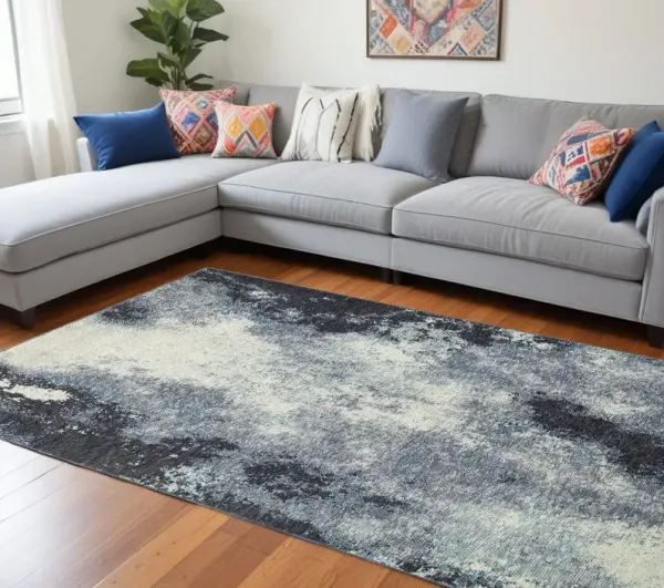 8.5' x 12.1' Abstract Power Loom Area Rug - Blue And Ivory