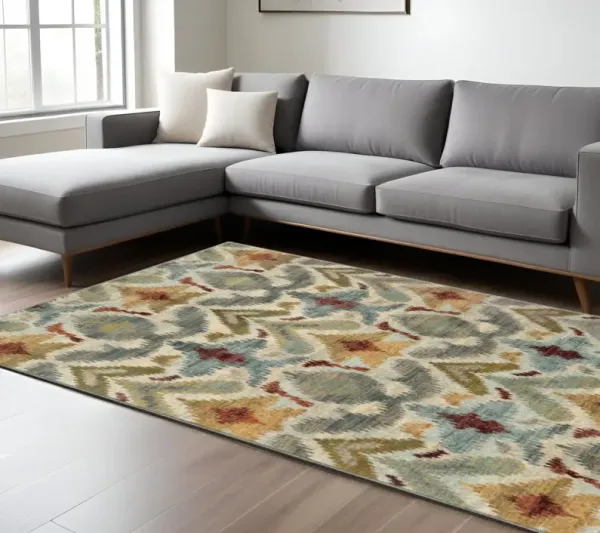 6' x 9' Abstract Power Loom Stain Resistant Area Rug - Ivory Gray Rust Gold And Blue