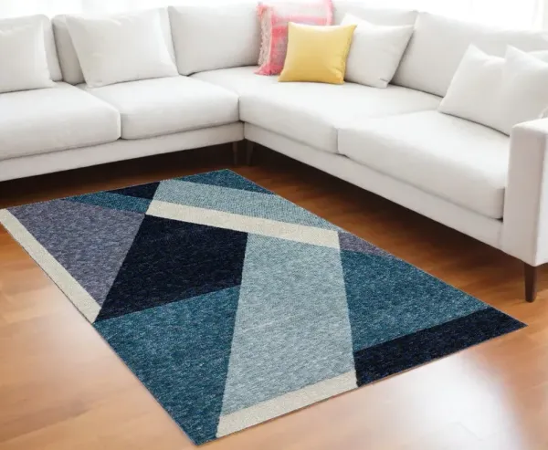 7' x 10' Geometric Power Loom Area Rug - Blue Purple Gray And Teal