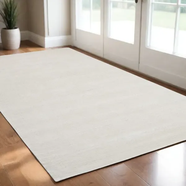 2' x 3' Hand Woven Distressed Area Rug - White