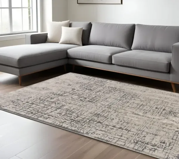 8' x 11' Abstract Stain Resistant Polypropylene Area Rug - Gray And Ivory