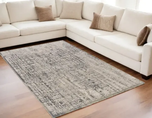 5' x 8' Abstract Stain Resistant Area Rug - Gray And Ivory