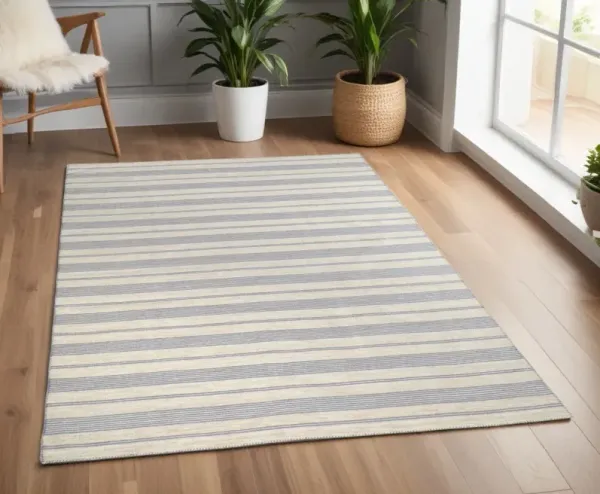 4' x 6' Striped Dhurrie Hand Woven Stain Resistant Area Rug - Blue Ivory And Tan