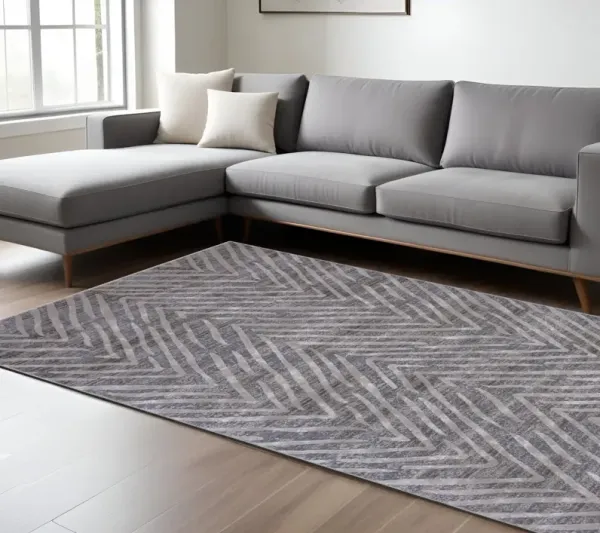 7' x 10' Abstract Polypropylene Area Rug - Gray