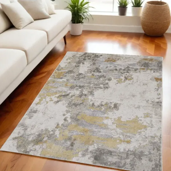5' x 8' Abstract Stain Resistant Area Rug - Ivory Gold And Gray