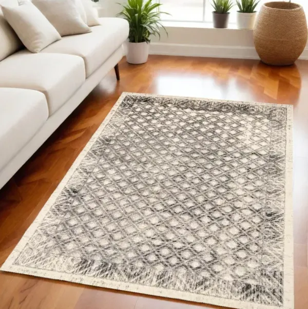 5' x 8' Abstract Stain Resistant Area Rug - Ivory Black And Taupe