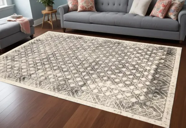 8' x 11' Abstract Stain Resistant Area Rug - Ivory Black And Taupe