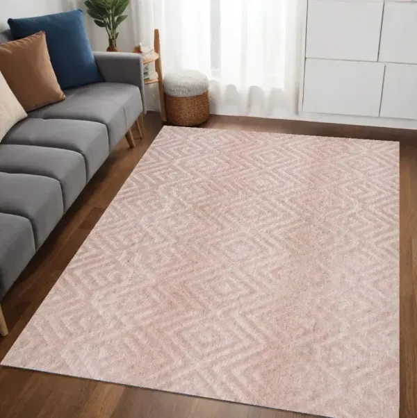 5' x 8' Geometric Stain Resistant Area Rug - Pink And Ivory