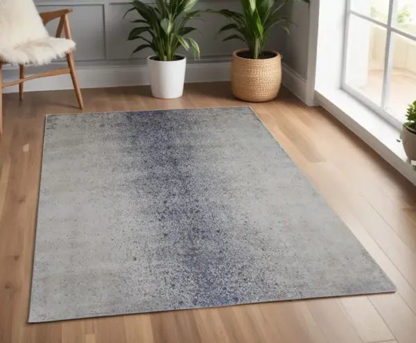 3.9' x 6' Abstract Power Loom Area Rug - Ivory And Blue