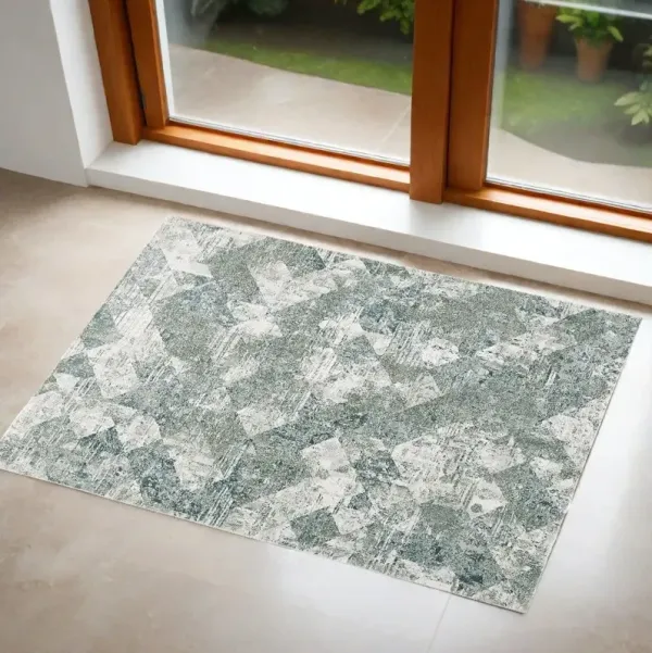 2' x 3' Patchwork Distressed Stain Resistant Area Rug - Green And Ivory