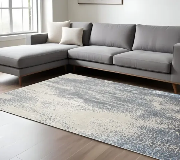 7' x 10' Abstract Stain Resistant Area Rug - Gray Blue And Ivory