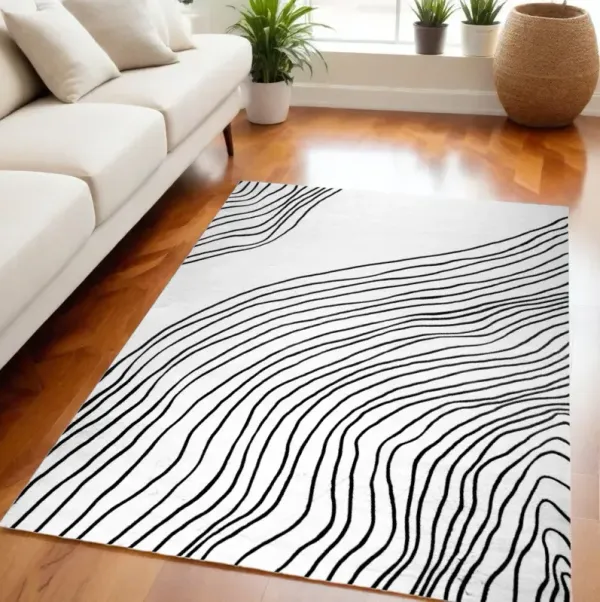 5' x 8' Abstract Distressed Area Rug - Black And White