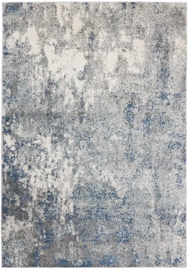 5.3' x 7.3' Blue Abstract Power Loom Area Rug - Gray And Light