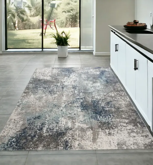 3.9' x 5.9' Abstract Power Loom Area Rug - Ivory Blue And Gray