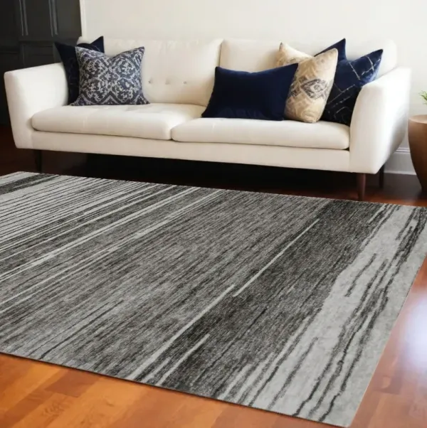 7' x 10' Abstract Power Loom Distressed Non Skid Area Rug - Gray And Black
