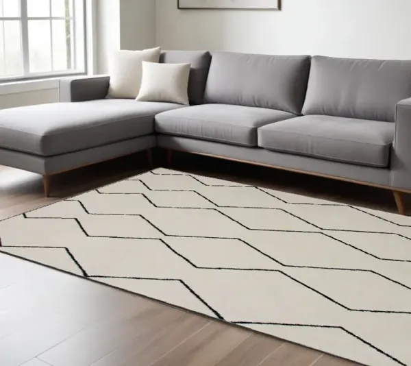 7' x 10' Geometric Power Loom Distressed Non Skid Area Rug - Beige And Black