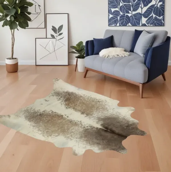 5' x 7' Cowhide Hand Knotted Area Rug - Brown And White