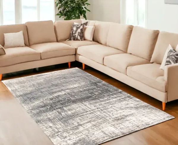 7' x 9' Abstract Non Skid Area Rug - Gray And White