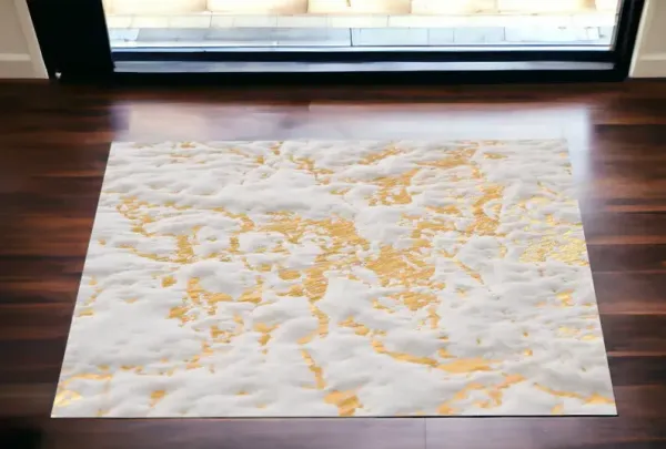 2' x 3' Faux Fur Abstract Shag Non Skid Area Rug - Gold And White